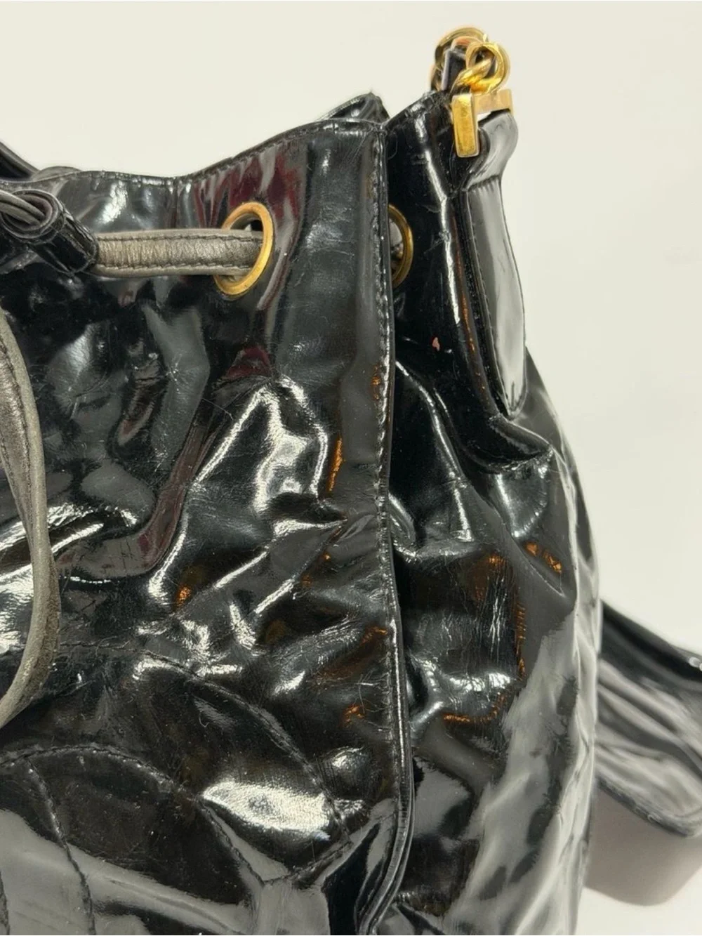 CHANEL Black Patent Leather Drawstring Bucket Crossbody